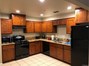Oak cabinets, granite countertops, tile floors
