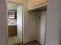 2 Closets in bedroom with above storage. located on right and left side of each other.