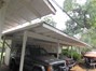 covered carport with storage for each unit.