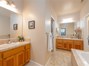 Master bath is complete with 2 separate vanity areas, jetted tub, and separate shower, toilet area