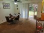 Dining area with access to back patio, Unit B.