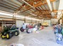 The shop features 3 roll up doors, plenty of electrical outlets, storage shelving and plenty of space to store your tools, farm equipment and toys!